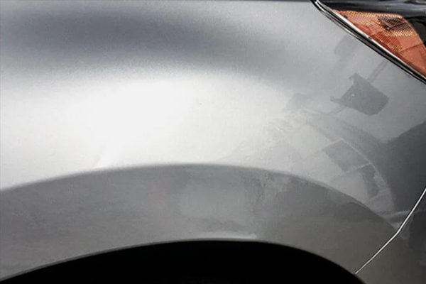 Vehicle after paintless dent removal - completely restored