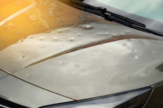 Car dent before paintless dent removal repair